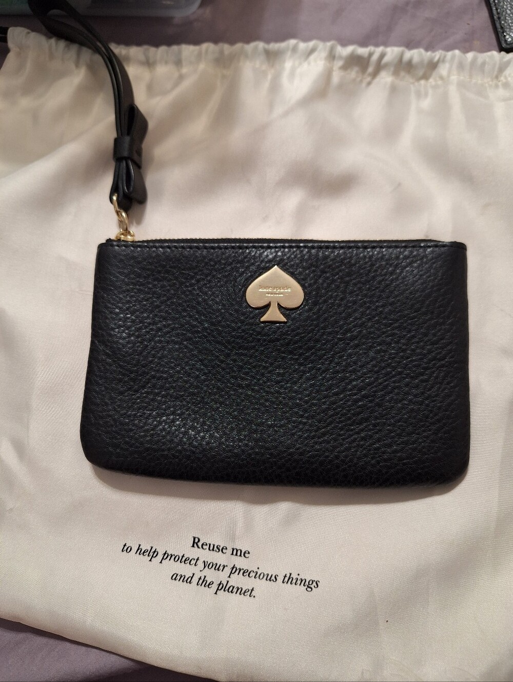 kate spade Black Pebbled Leather Wristlet with Gold Spade Logo
